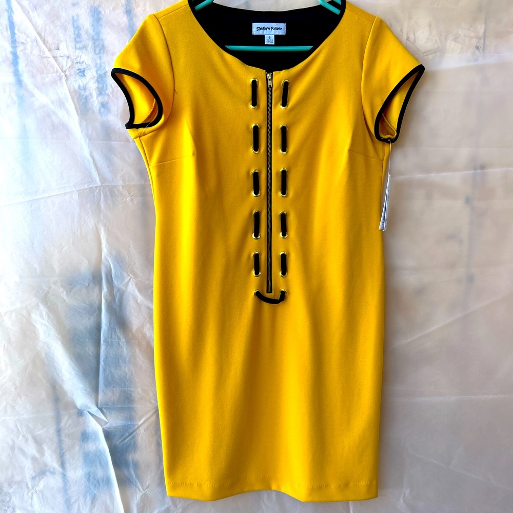 It a black and mustard color with sleave
